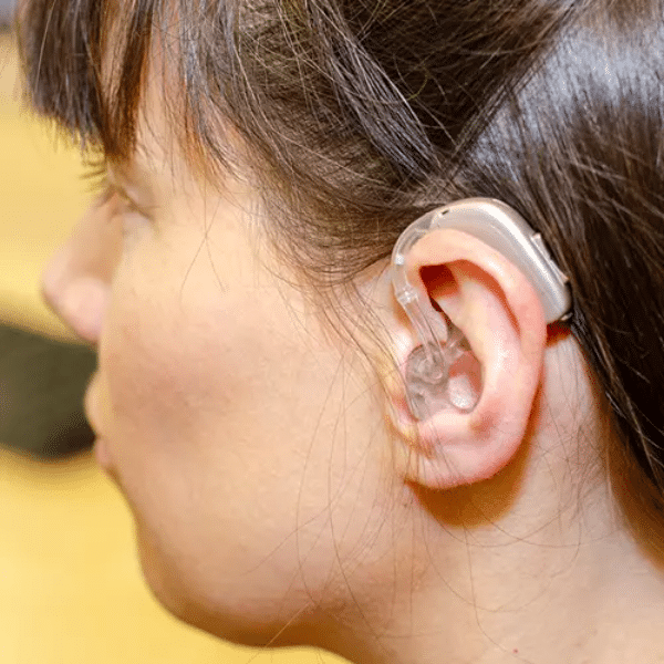ear with hearing aid inserted
