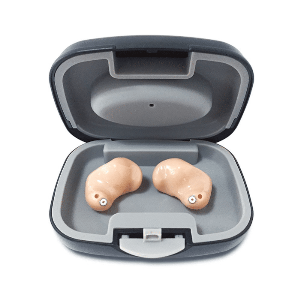 hearing aids sitting in a storage case